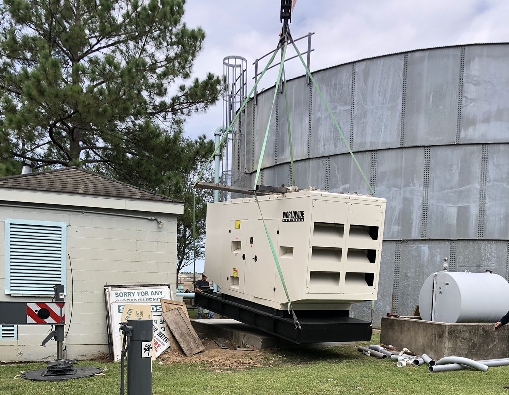 mud-43-lowering-generator MUD 43 - Installing generator onto concrete pad