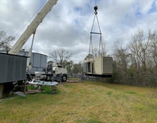 Multiple MUD project - generator being hoisted by crane