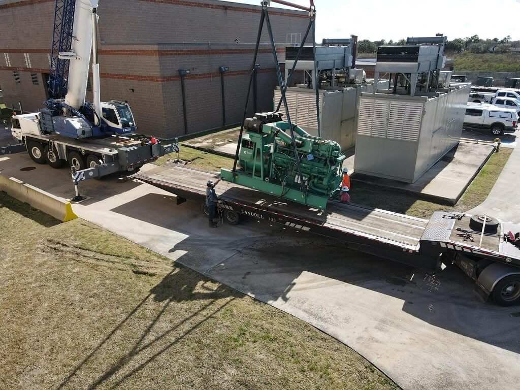generator-engine-trailer Generator engine arriving on trailer for municipal power generation project