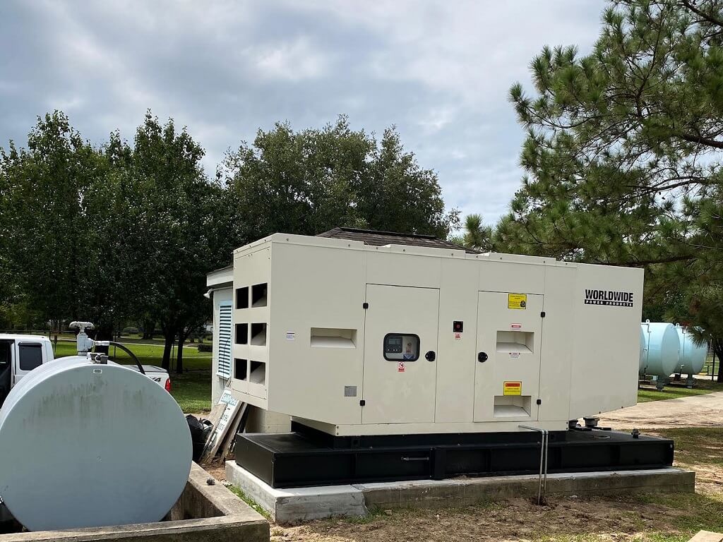 wpp-municipal-project-generator-on-pad WPP genset and fuel tank at municipal power generation project