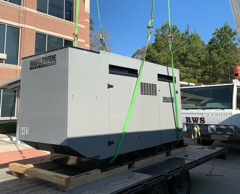 Commercial generator installation with crane